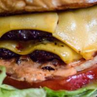 Flip N Out Burger · Double cheeseburger, lettuce, tomato, onion, spicy banana pepper ketchup