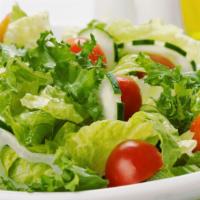 Green Salad · Cucumber, tomatoes, green peppers and onion.