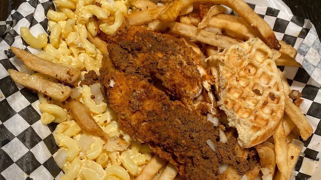 Wild Plates · Burgers, chicken tenders or red hots, over homemade mac salad and French fries, smothered with meat sauce and onions and a savory waffle.