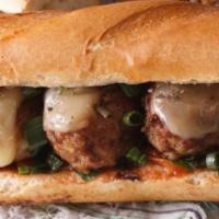 Meatball Sub · Topped with homemade meatballs and classic cheese.