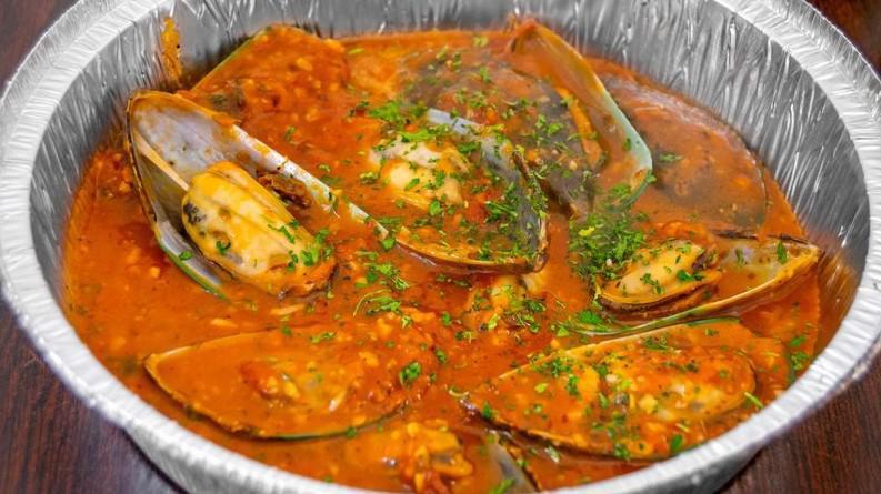 Mussels Marinara · Sweet and rich mussels cooked in a tomato sauce.