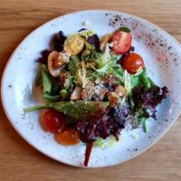 Simple Salad · Organic baby greens, heirloom tomatoes, garlic croutons, parmesan cheese, moscatel vinaigret...