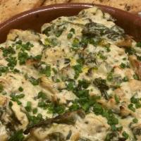 Spinach Artichoke Dip · Kite Hill ricotta and cream cheese, chives, garlic toast. (VEGAN)