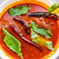 Tomato Rasam · Rasam a South Indian wonder dish that is a spicy-sweet-sour stock traditionally prepared usi...