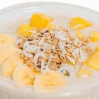 The Coconut Bowl · Base Blend: coconut, cream of coconut, banana
Topped with: granola, banana, pineapple, cocon...