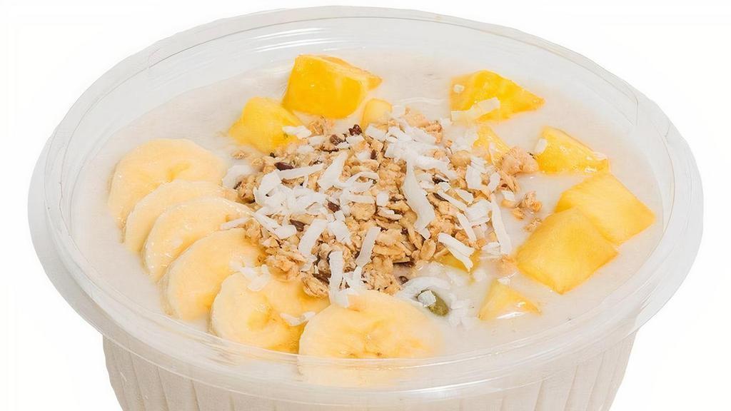 The Coconut Bowl · Base Blend: coconut, cream of coconut, banana
Topped with: granola, banana, pineapple, coconut
610 calories