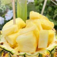 Fresh Cuts Of Pineapple Bowl · Freshly cut Maui Gold pineapple served inside a pineapple bowl.