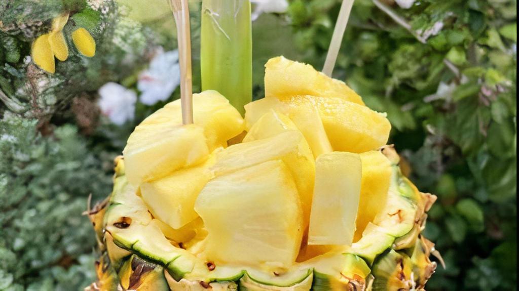 Fresh Cuts Of Pineapple Bowl · Freshly cut Maui Gold pineapple served inside a pineapple bowl.