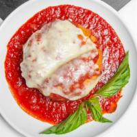 Parm It Up · Our sicilian rice ball cut in half and topped with marinara sauce and melted mozzarella.