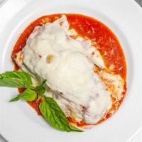 Lasagna · Meat sauce, ricotta, and mozzarella.