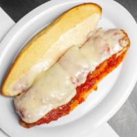 Chicken Parmigiana · Chicken cutlet topped with our marinara sauce and melted mozzarella.
