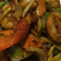 Pad Thai · Spicy. Stir fried Thai rice noodle with chicken or jumbo shrimp and mixed vegetable topped w...