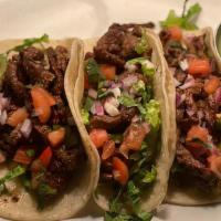 Carne Adada Tacos · Grilled steak, onions, cilantro & pico de gallo