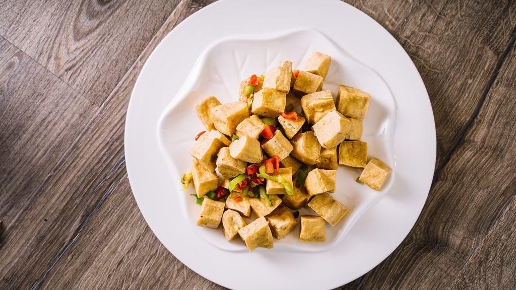 Stir Fried Tofu With Salted Peppers · Fried tofu, green peppers, red peppers.