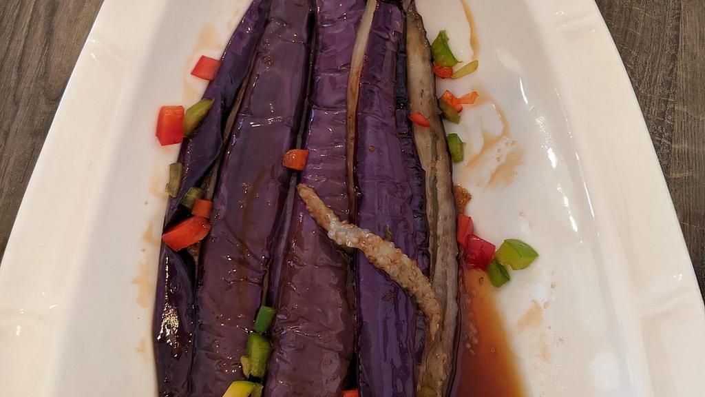 Sauteed Eggplants · Eggplants, green peppers, red peppers.