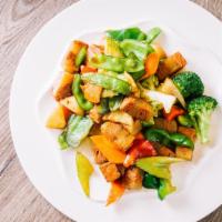 Sauteed Vegan Braised Pork · Vegan braised pork. carrots, broccoli, potatoes, snow peas, celery, green peppers, red peppe...