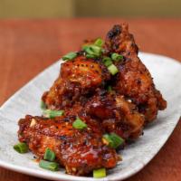 House Crispy Wings · Crispy wings tossed in house sweet & sour soy chili sauce, scallion, minced garlic, sesame s...