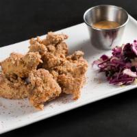 Kara-Age Fried Chicken Nuggets - App · Koji marinated chicken thigh served w. house slaw