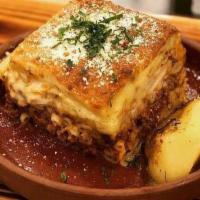 Pastichio · Imported Greek bucatini pasta layered with seasoned meat sauce topped with creamy bechamel.