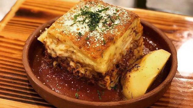 Pastichio · Imported Greek bucatini pasta layered with seasoned meat sauce topped with creamy bechamel.