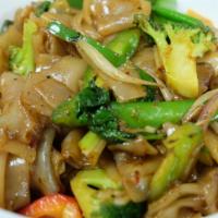 Pad Kee Mao · Stir-fried flat rice noodles with bean sprouts, onion, and red pepper basil in chili paste. ...