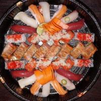 Sushi Bar Party Tray C · Red dragon roll, spicy girl roll, California roll, and 14 pieces sushi. Served with salad or...