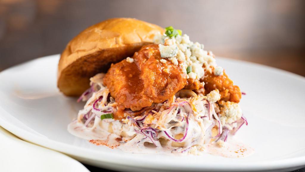 Buffalo Chicken Sandwich · Buttermilk fried chicken, hot sauce, and buttermilk tossed coleslaw served on ciabatta bread with the choice of soup, salad or hand-cut fries.