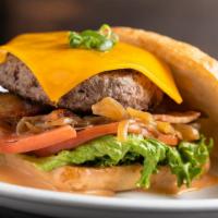 Deluxe Burger · Bacon, tomato, cheddar cheese, lettuce, and house sauce. Served on Brioche bread with mixed ...
