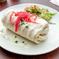 Steak Burrito · Served with Rice, Beans,Onions,Sour Cream and Pico De Gallo.