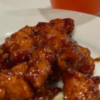 Chicken Wings · 6 pieces.