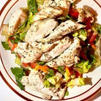 Greek Salad With Chicken · Made with tender chicken thighs, feta cheese, cucumbers, tomatoes, onions, avocado, and more...