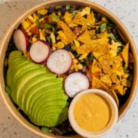 Skinny Taco Salad · Romaine, beans, pico, v. sour cream, avocado, corn, tomatoes, onions, v. cheddar cheese and ...