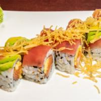 Bird Of Paradise Roll · Made with salmon and mango topped with tuna avocado and drizzle with sumiso (sweet miso) sau...