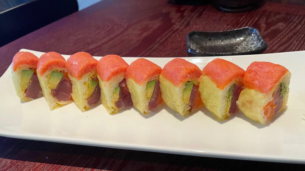  Autumn Roll · Tuna, salmon and avocado wrapped in soy paper and topped with spicy tuna.