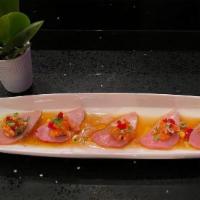 Yellowtail Tango · Yellowtail, sear salmon, tobiko, and jalapeno with Yuzu sauce