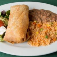 Chimichanga · A giant flour tortilla deep fried & filled with cheese & stuffed with shredded chicken or be...