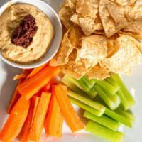 Hummus Platter · Vegan. Roasted garlic hummus topped with olive tapenade and served with fresh veggies and to...