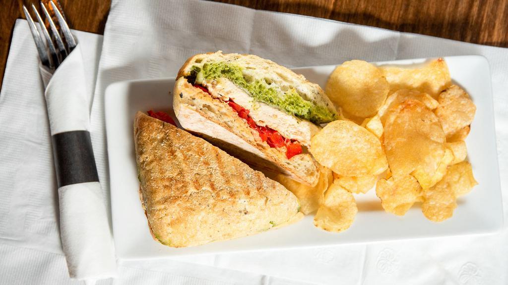 Pesto Chicken · Grilled chicken, Mozzarella cheese, roasted red peppers and pesto.