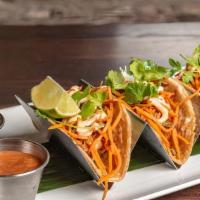 Grilled Shrimp Tacos · Grilled Scallion relish,ancho chile flakes,cilantro spicy aioli.