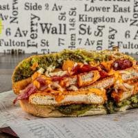 Trainwreck · Topped with cooked turkey bacon, mozzarella sticks and avocado with pesto with your choice o...