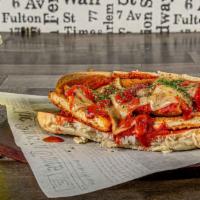 Critical Mass · Topped with melted mozzarella cheese, waffle fries, iceberg lettuce, oregano, marinara sauce...