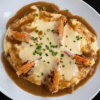 -Shrimp And Cheesy Grits · Jumbo Cajun shrimp with Anson Mills grits, Gruyere cream sauce & peppercorn gravy.