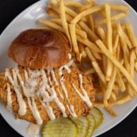 -Chicken Filet Sandwich · Buttermilk fried chicken breast with garlic aioli and pickle slaw on toasted brioche.