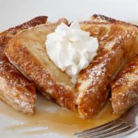 French Toast · Fresh homemade French toast made from thick challah bread.