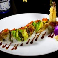 Rainbow Roll · Crab Sticks and avocado inside with tuna, salmon and fish outside.