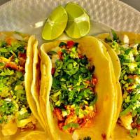 Tacos · Choice of meats- chicken, carnitas, chorizo, carne enchilada, bistek. Onion and cilantro.