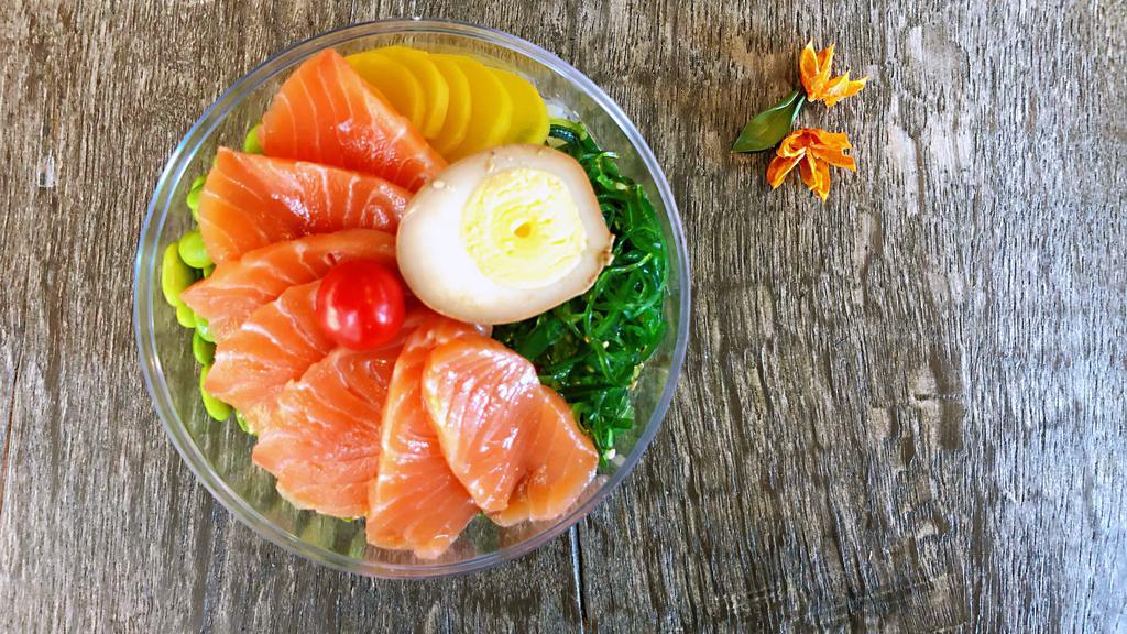 Salmon Don · Salmon, Avocado, Edamame, Seaweed Salad, Oshinko, Sesame, Tea - Egg, and Soy Sauce, or Wasabi Yuzu.