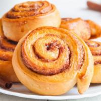 Cinnamon Rolls · Freshly rolled cinnamon rolls.