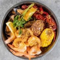 The Cajun Boil · Half lb shrimp head off, half lb craw-fish