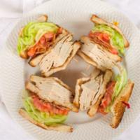 Triple Decker · Roasted turkey, bacon, lettuce, tomato, with mayo, of white toast. Served with French fries